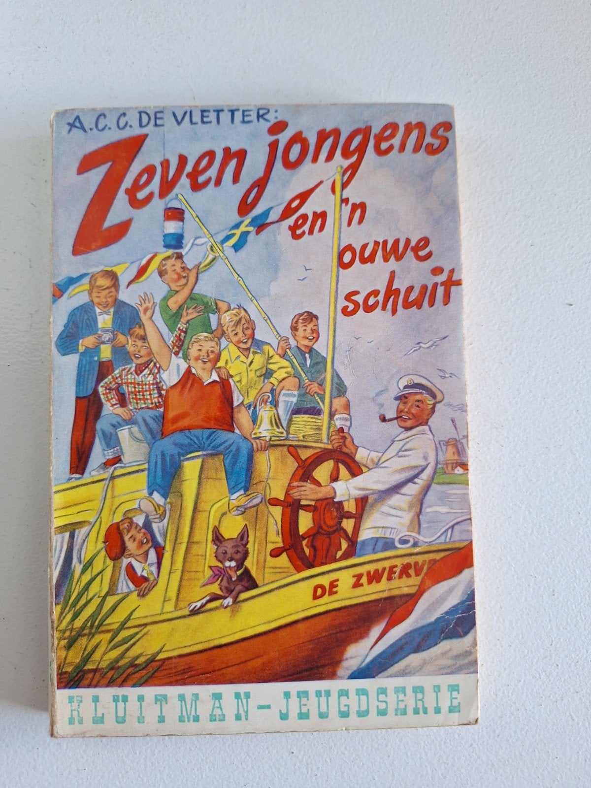 Zeven Jongens en 'n Ouwe Schuit - A.C.C. de Vletter, Ophalen of Verzenden, Gelezen, A. C. C. de Vletter, Fictie algemeen