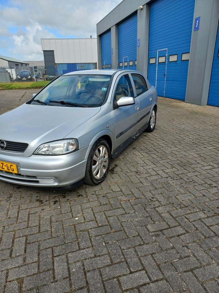 Opel astra 1.8 2002, Auto's, Beige, 4 cilinders, Leder, Handgeschakeld