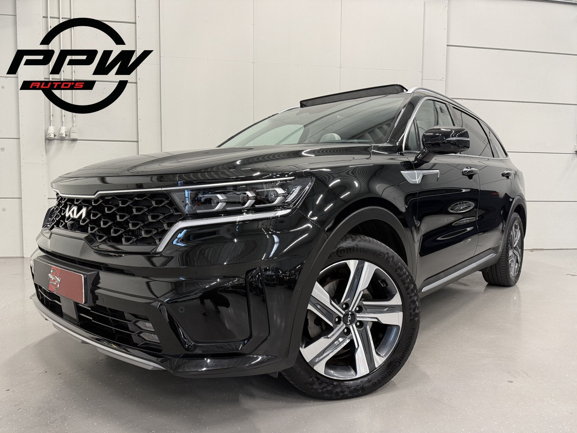 Kia Sorento 1.6 T-GDI Plug-in Hybrid 4WD ExecutiveLine 7p. P, Auto's, Gebruikt, Zwart, 4 cilinders, Met garantie (alle)