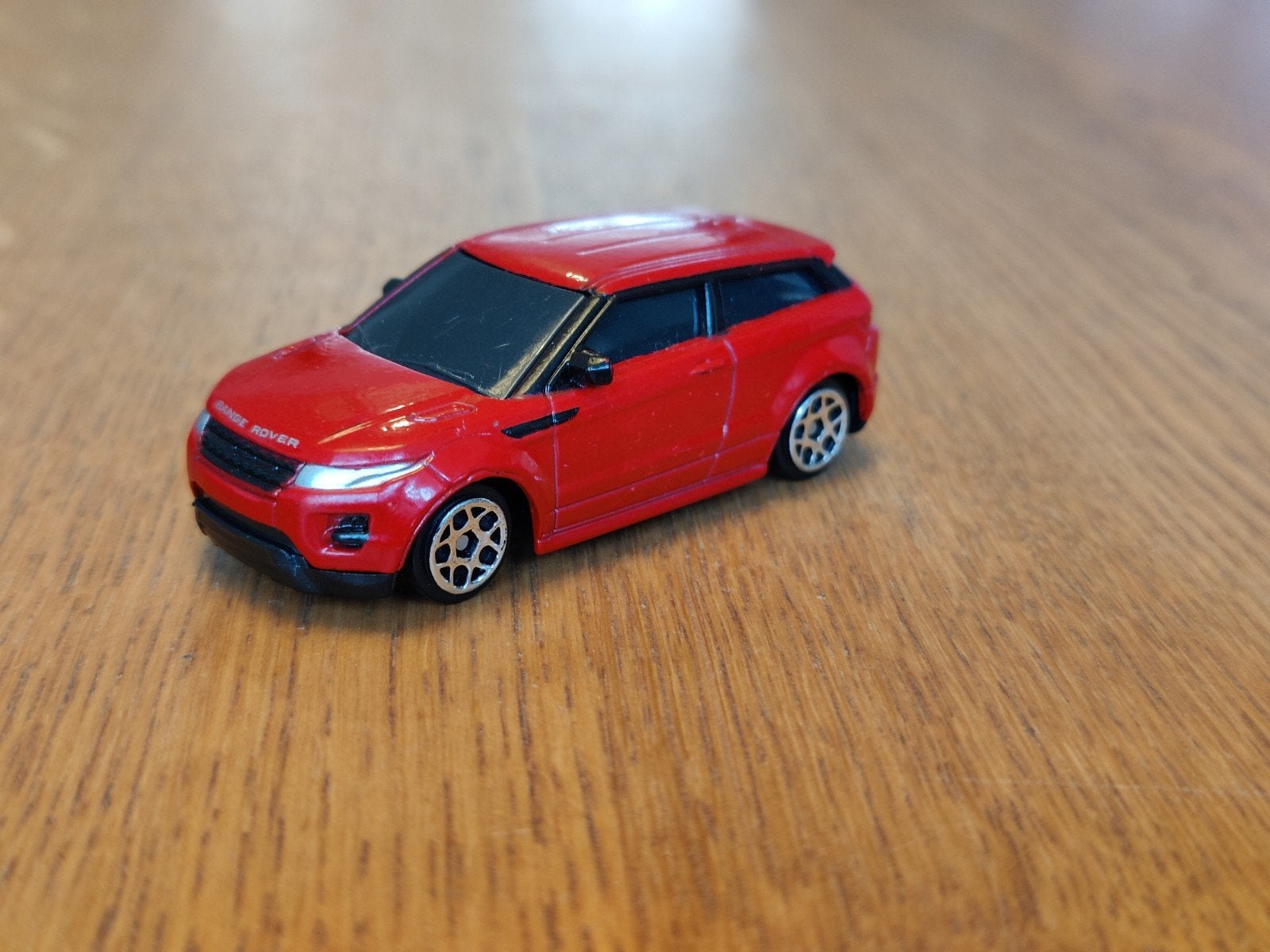 Uni Range Rover Evoque ROOD, Ophalen of Verzenden, Zo goed als nieuw, Auto