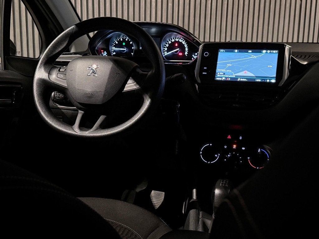 Peugeot 208 1.2 PureTech Blue Lion | Carplay | Airco | Garan, Voorwielaandrijving, Stof, Gebruikt, 1199 cc