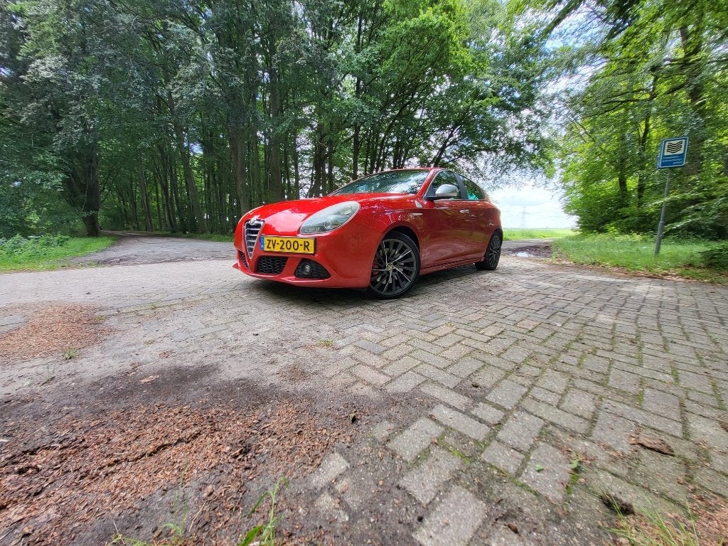 Alfa Romeo Giulietta 1.750 TBI 2012 Rood, Auto's, Alfa Romeo, Particulier, Giulietta, Airbags, Airconditioning, Climate control