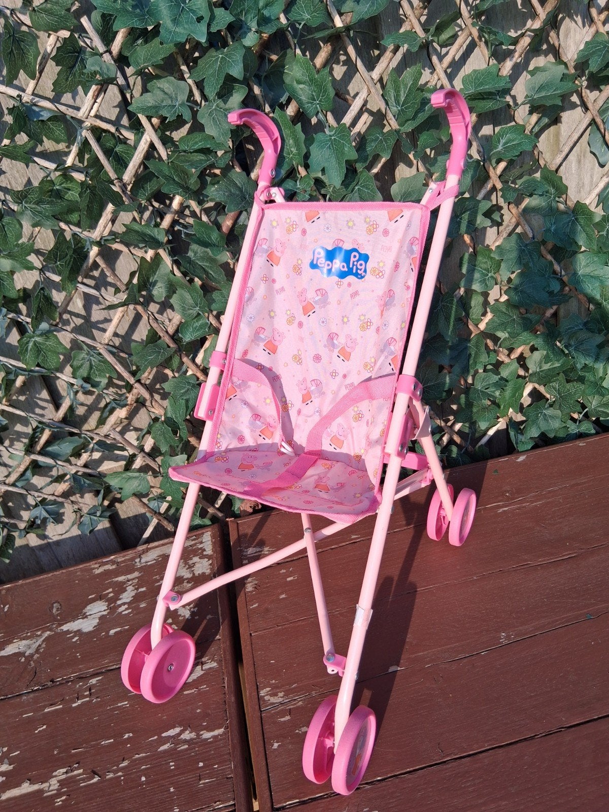 Peppa Pig poppenwagen - Roze, Ophalen of Verzenden, Gebruikt, Babypop