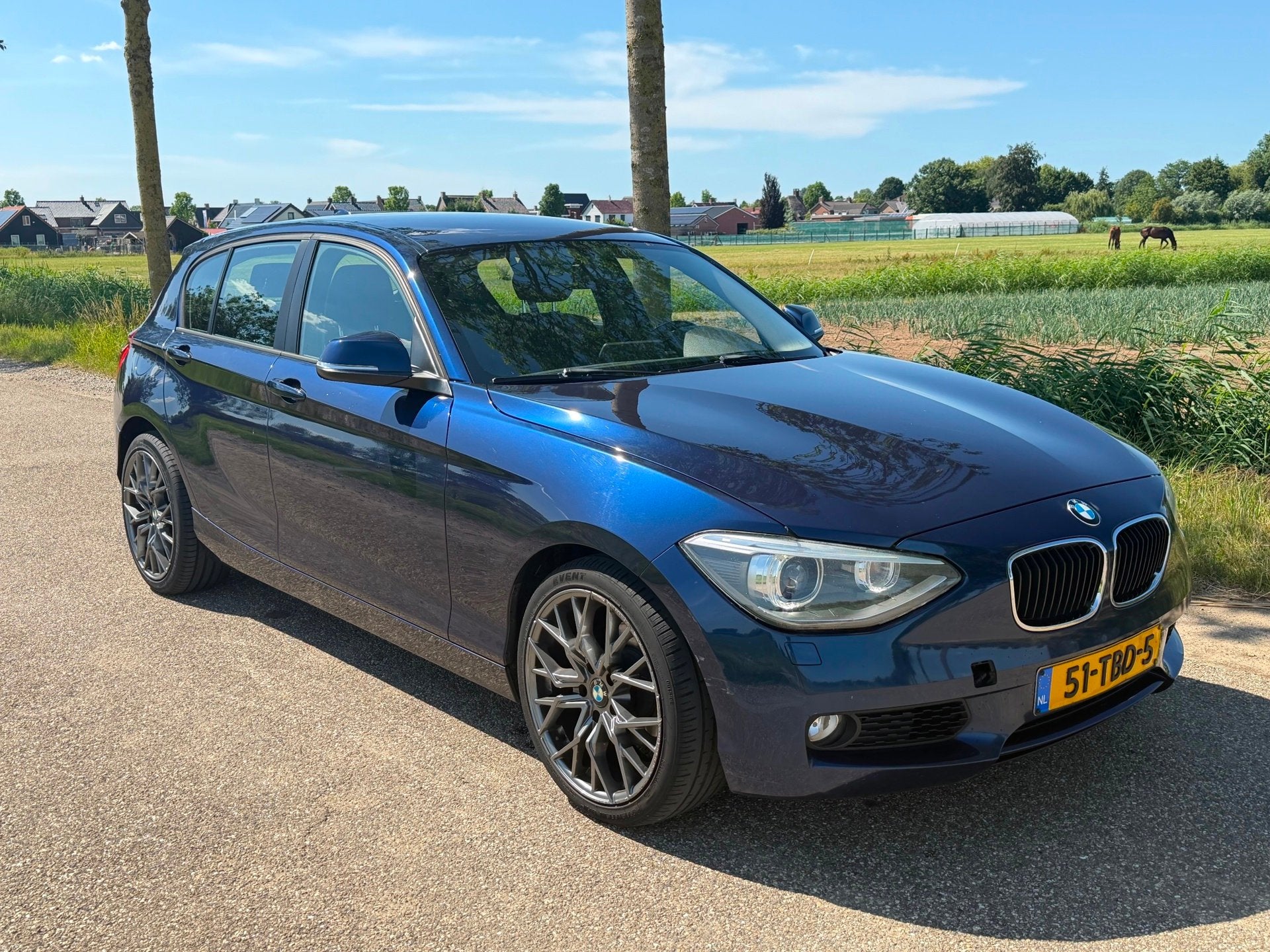 BMW 1-serie 118i Business AUT APK 06-2027 NAP Airco, Auto's, BMW, Euro 5, Gebruikt, Zwart, 4 cilinders