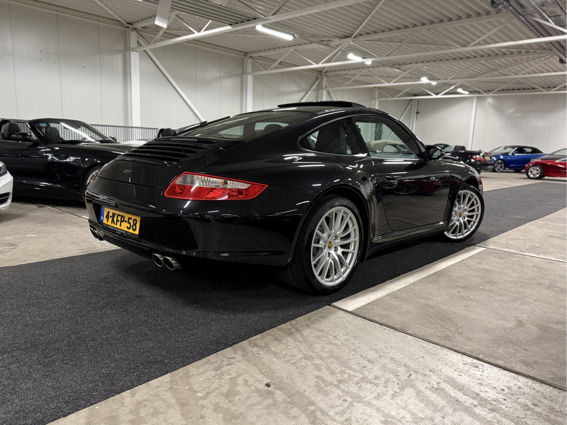 Porsche 911 [997] 3.6 Carrera 4 Coupé Aut. l Schuifdak l Xe, Automaat, Gebruikt, Zwart, 4 stoelen