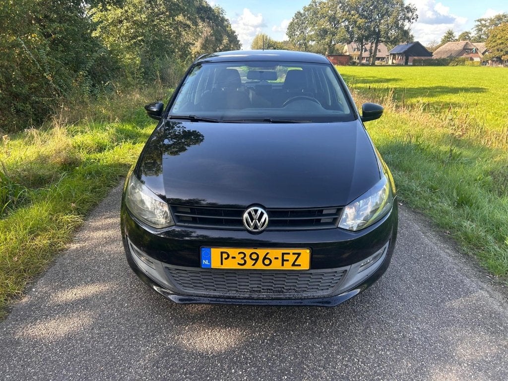 Volkswagen Polo 1.2 6V 44KW 5D My2010 Zwart, Auto's, Voorwielaandrijving, 1198 cc, Zwart, Handgeschakeld