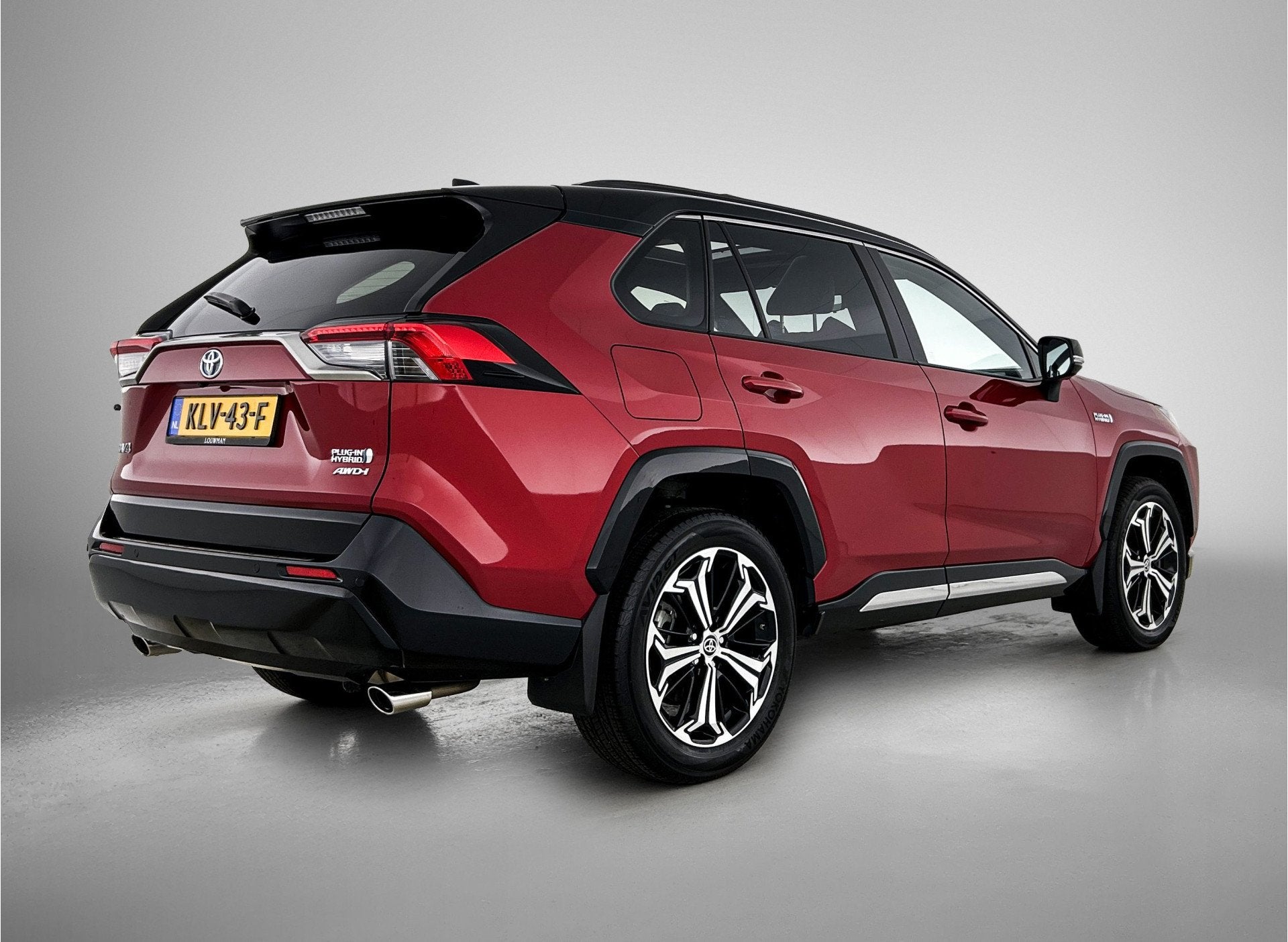 Toyota RAV4 2.5 Plug-in Hybrid AWD Bi-Tone Plus | Dealer ond, Auto's, Toyota, Automaat, Gebruikt, 4 cilinders, Bedrijf