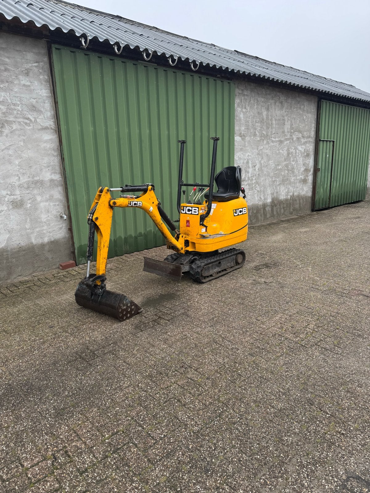 Jcb 8008 minigraver, 2 bakken, verstelbaar rijwerk, Zakelijke goederen, Machines en Bouw | Kranen en Graafmachines, Ophalen, Graafmachine