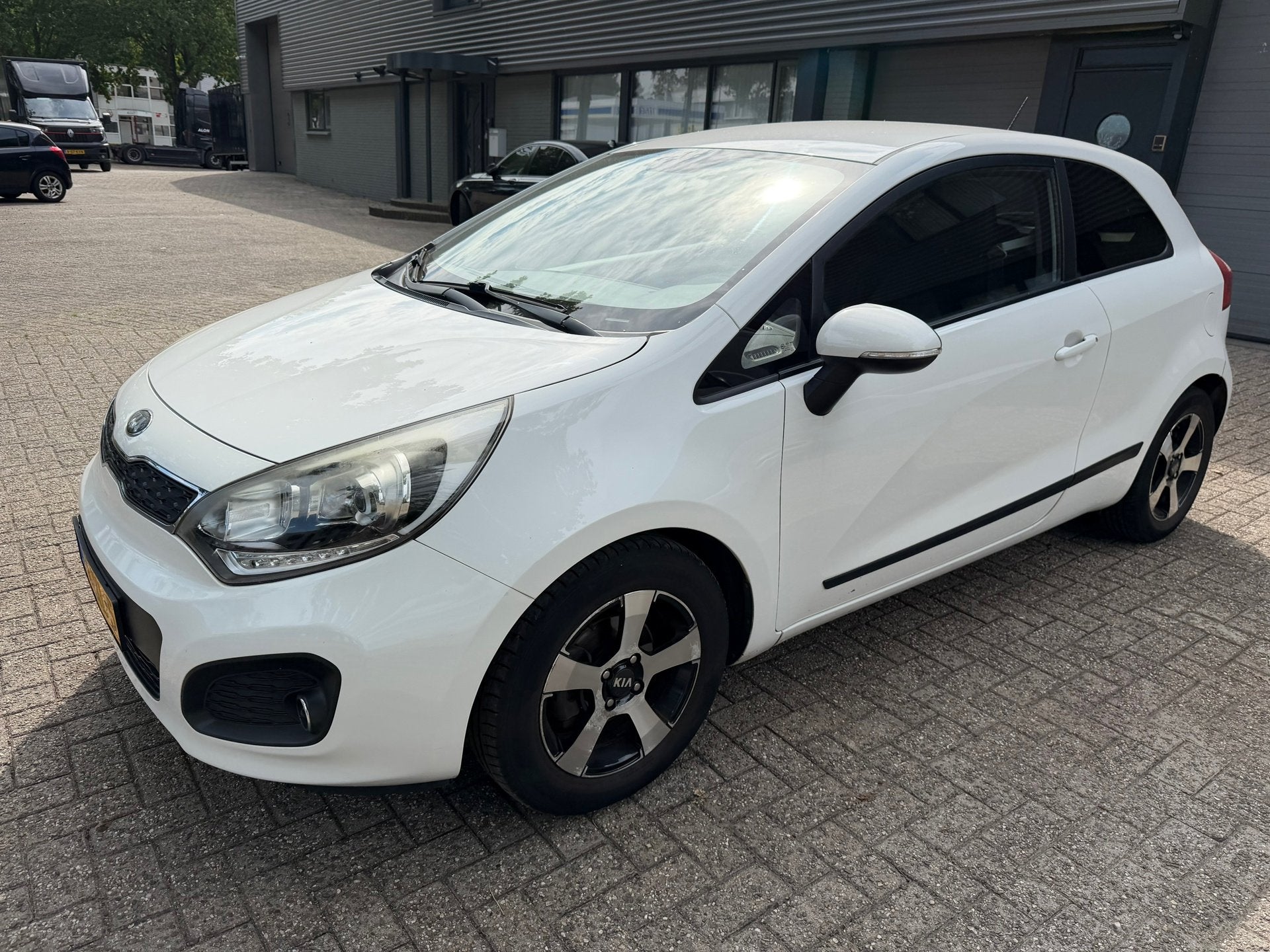 Kia Rio 1.2 CVVT Plus Pack, Auto's, Euro 5, 4 cilinders, Wit, Origineel Nederlands