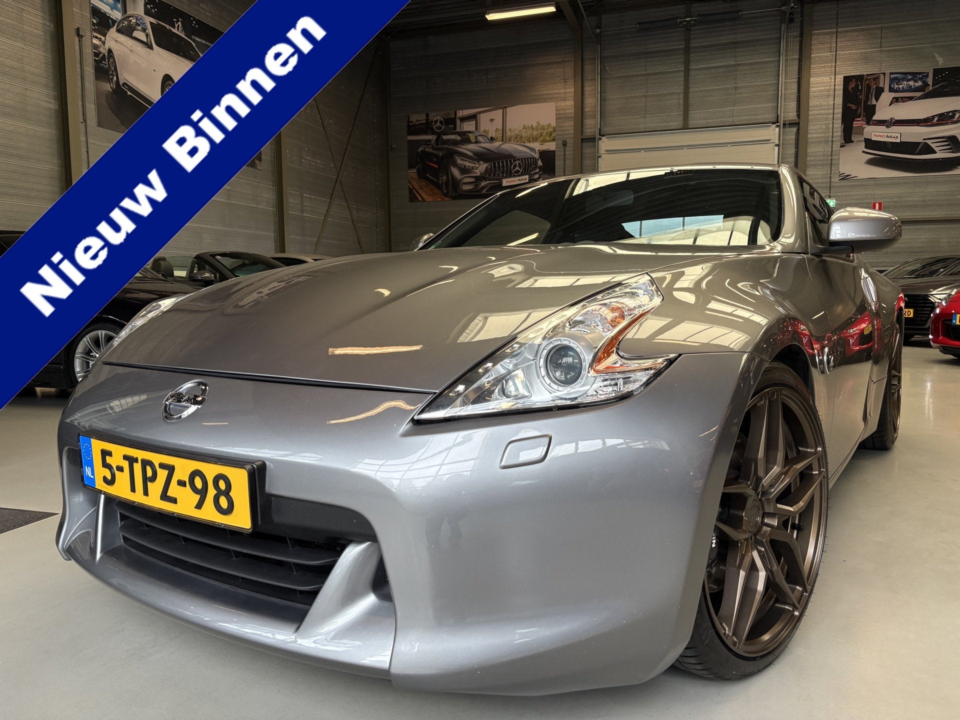 Nissan 370Z 3.7 V6 Pack Bose, Cruise, Navi (bj 2012), Auto's, Nissan, Automaat, Achterwielaandrijving, Gebruikt, Zwart