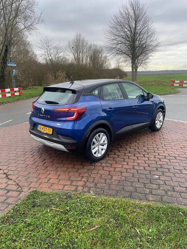 Renault Captur E-tech Hybrid 145pk Aut 2022 Blauw, Stof, 715 kg, Blauw, Origineel Nederlands