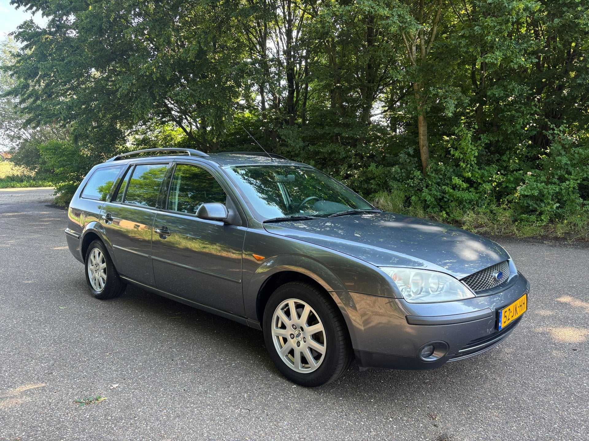 Ford Mondeo Wagon 1.8-16V Trend | Clima | APK 04-2027, Auto's, Gebruikt, Zwart, 4 cilinders, Handgeschakeld