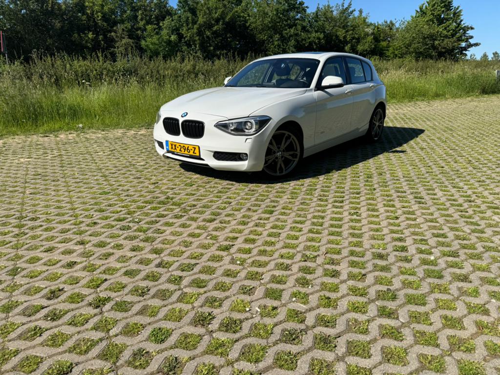 BMW 1-Serie 116I 100KW 5DR 2012 Wit, Auto's, BMW, 1-Serie, 4 cilinders, Wit, 1265 kg
