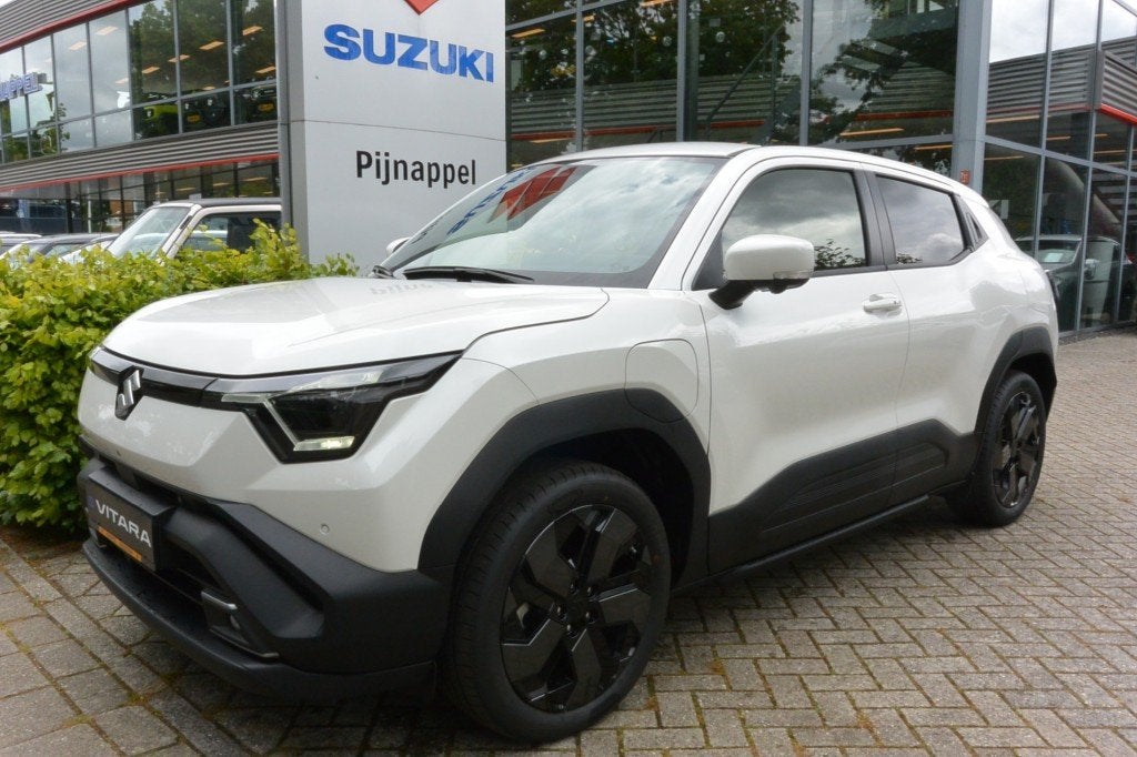 Suzuki E-VITARA STYLE 61 KWH AUTOMAAT - VOLLEDIG ELEKTRISCH, Automaat, Gebruikt, Met garantie (alle), Wit
