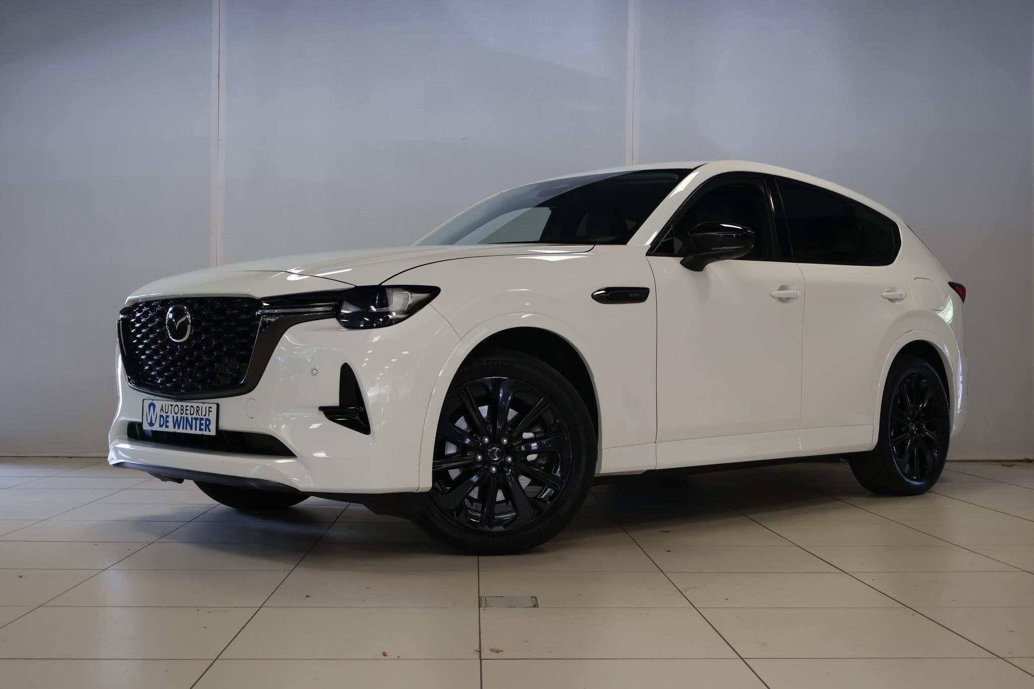 Mazda CX-60 2.5 e-SkyActiv PHEV Homura, Auto's, Mazda, Automaat, Gebruikt, 4 cilinders, Met garantie (alle)