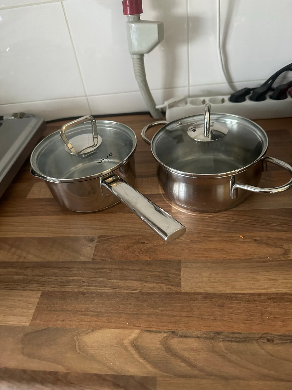 Vivo RVS pannenset met glazen deksels, Huis en Inrichting, Ophalen, Met deksel, Pannenset, Zo goed als nieuw