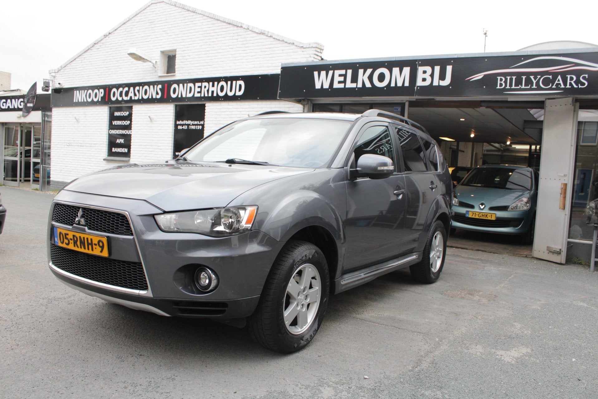 Mitsubishi Outlander 2.0 Intro Edition / AUTOMAAT / CruiseCo, Auto's, Zwart, 4 cilinders, Leder en Stof, Origineel Nederlands