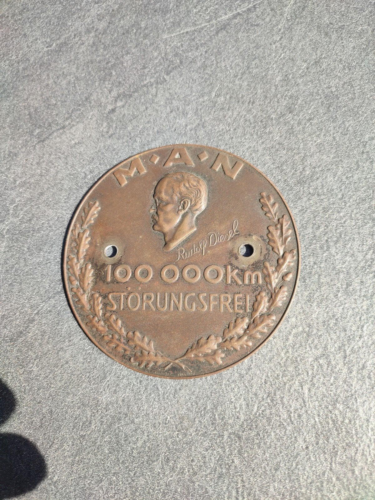 MAN MOTOR 100.000 KM storingsvrij bronzen plaquette, Ophalen of Verzenden, Gebruikt
