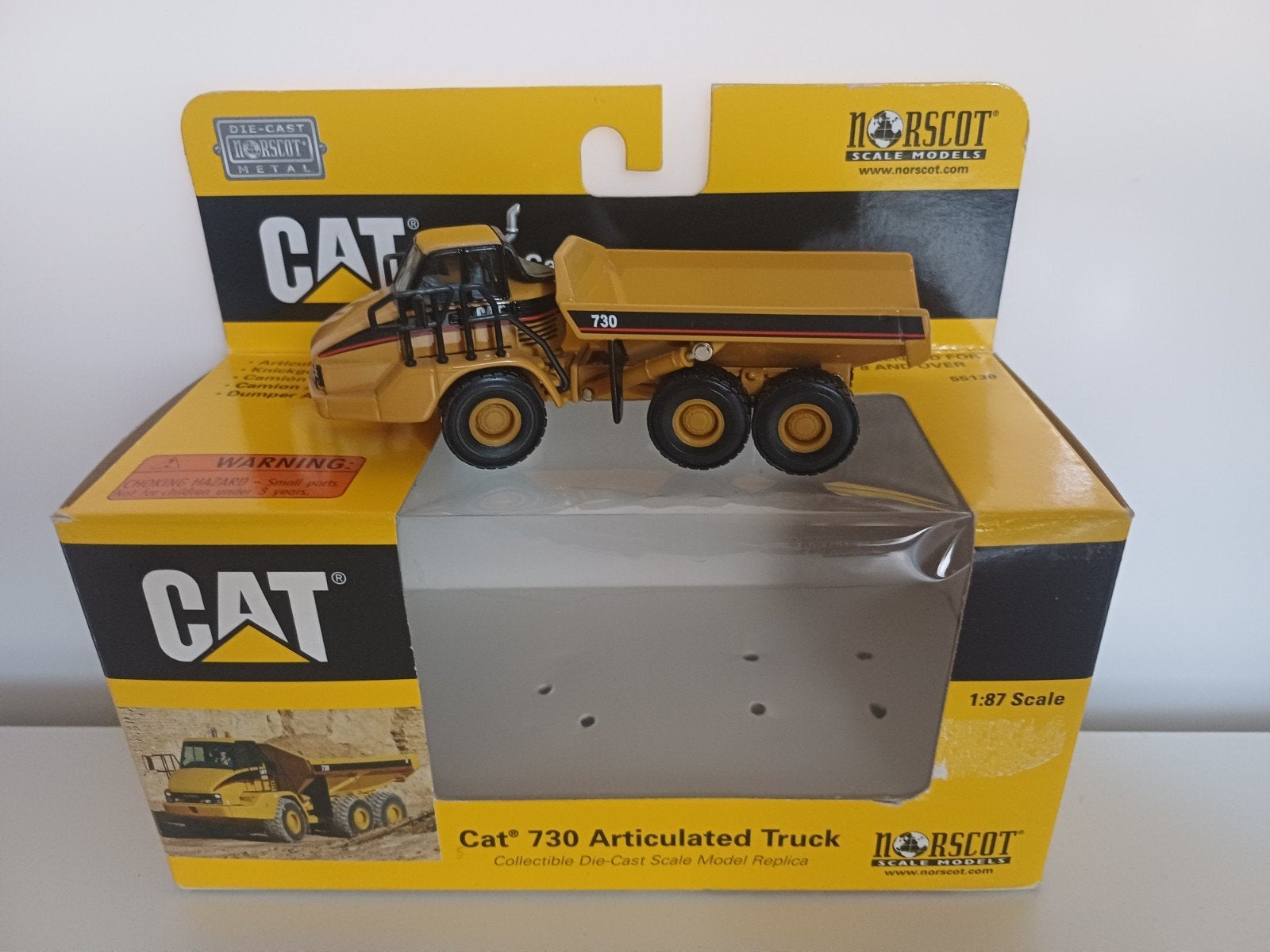 Norscot # Cat 730 Articulated truck 1/87, Hobby en Vrije tijd, Modelauto's | 1:87, Verzenden, Zo goed als nieuw, Hijskraan, Tractor of Landbouw