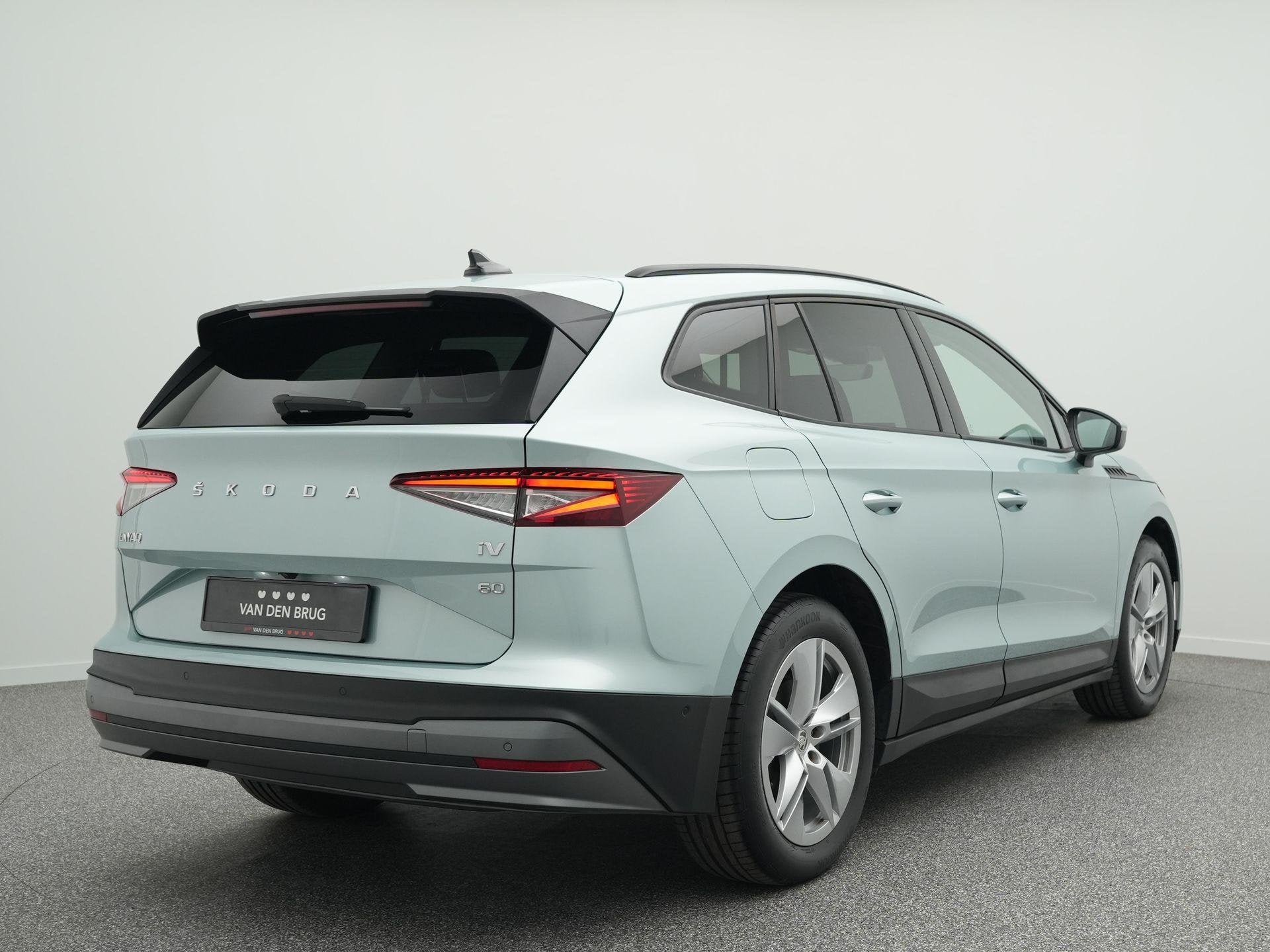 Skoda Enyaq iV 60 | Elektrische Trekhaak | Keyless | Stoelve, Auto's, Automaat, Achterwielaandrijving, Gebruikt, 179 pk