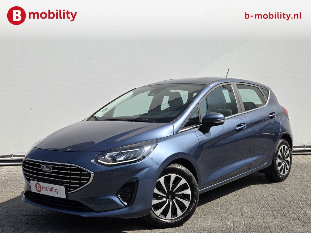 Ford Fiesta 1.0 EcoBoost Hybrid Titanium Stoel/Stuurwielverw, Auto's, Ford, Voorwielaandrijving, Gebruikt, 1133 kg, Blauw