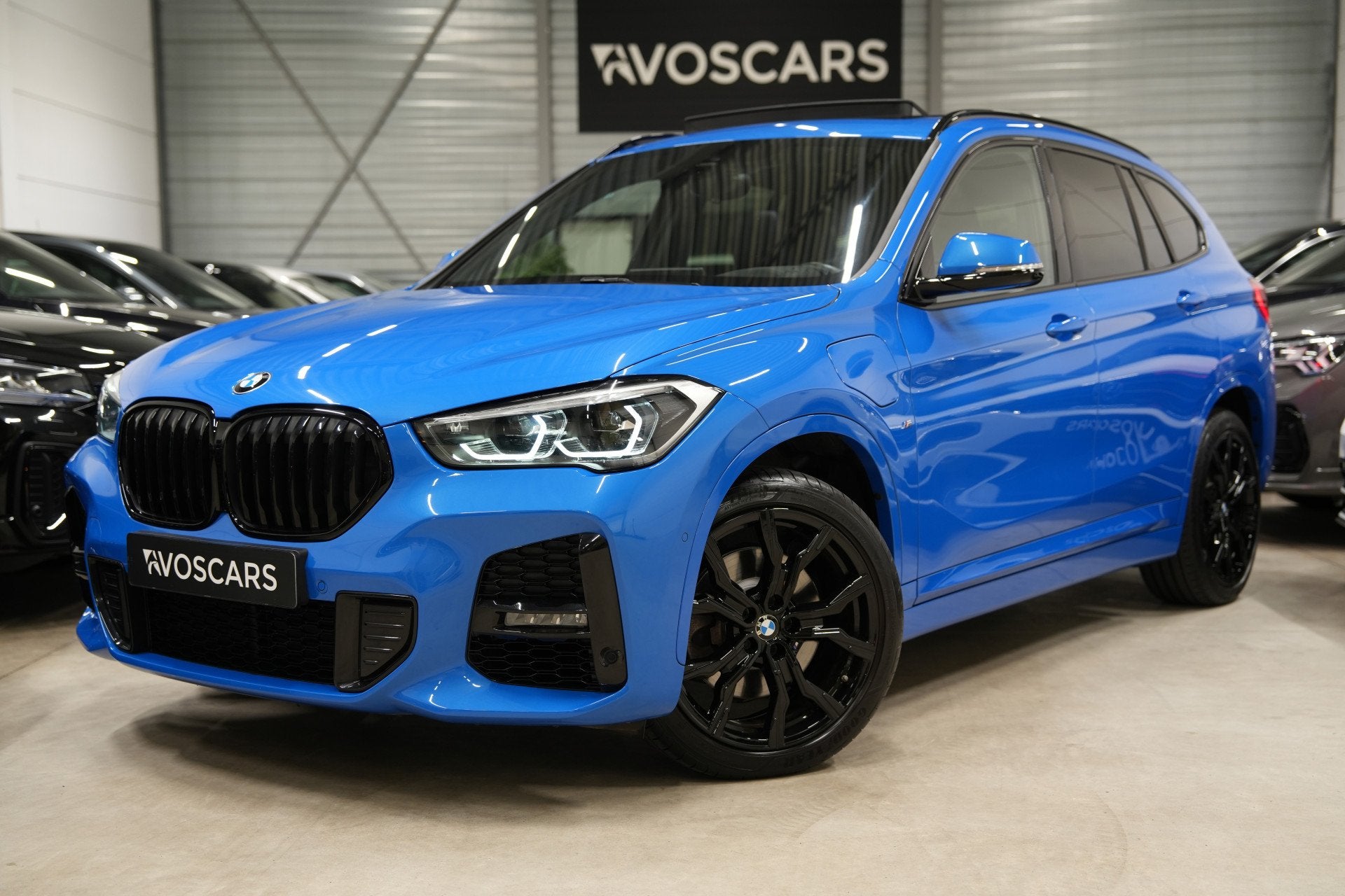 BMW X1 xDrive25e M Sport * SoH 97% - Pano - Leder - Trekhaak, Auto's, Dealer onderhouden, Gebruikt, Met garantie (alle), Blauw