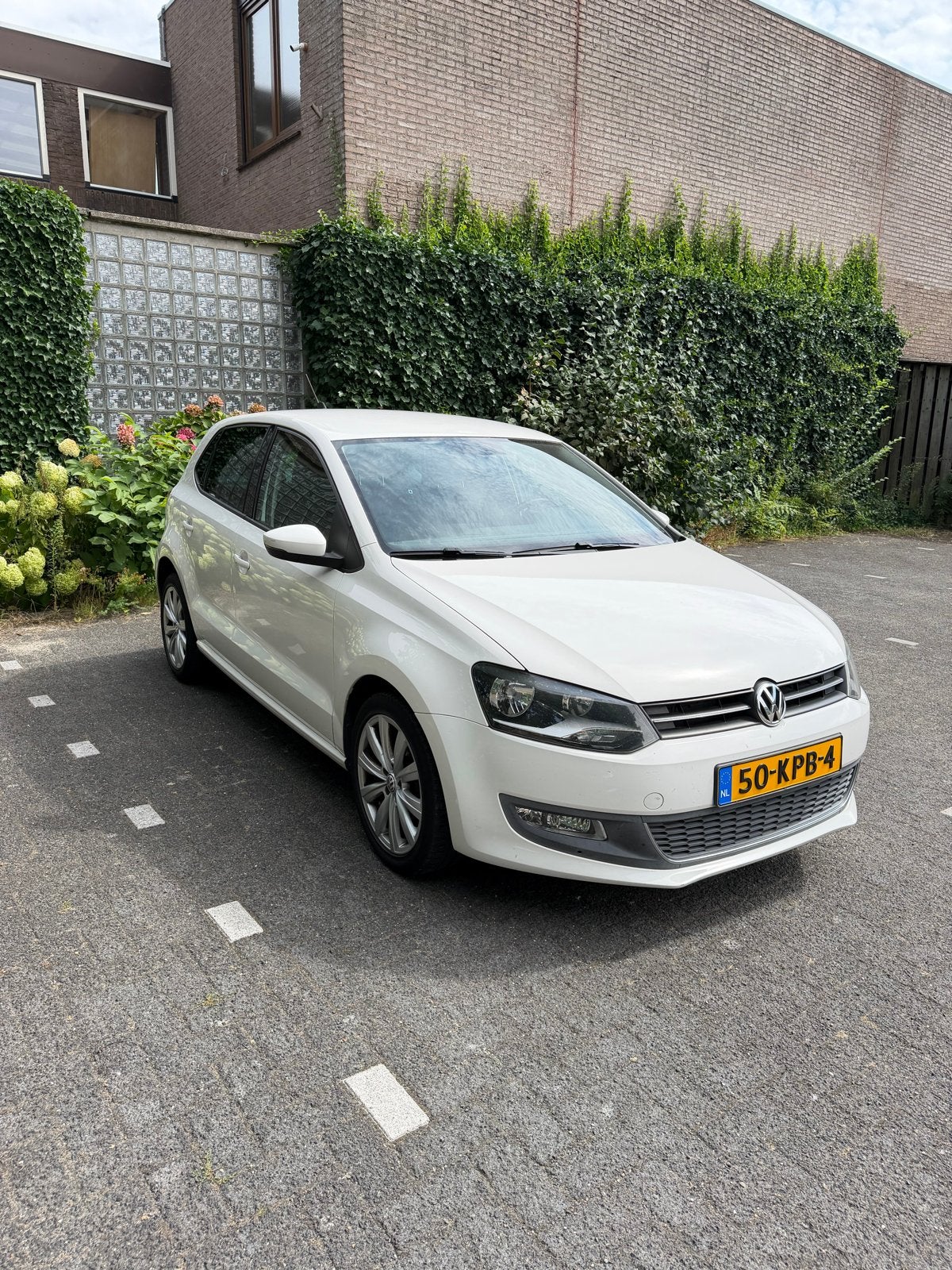 Volkswagen Polo 1.4 16V FSI 63KW 2010 Wit, Auto's, Voorwielaandrijving, 970 kg, 40 €/maand, 4 cilinders
