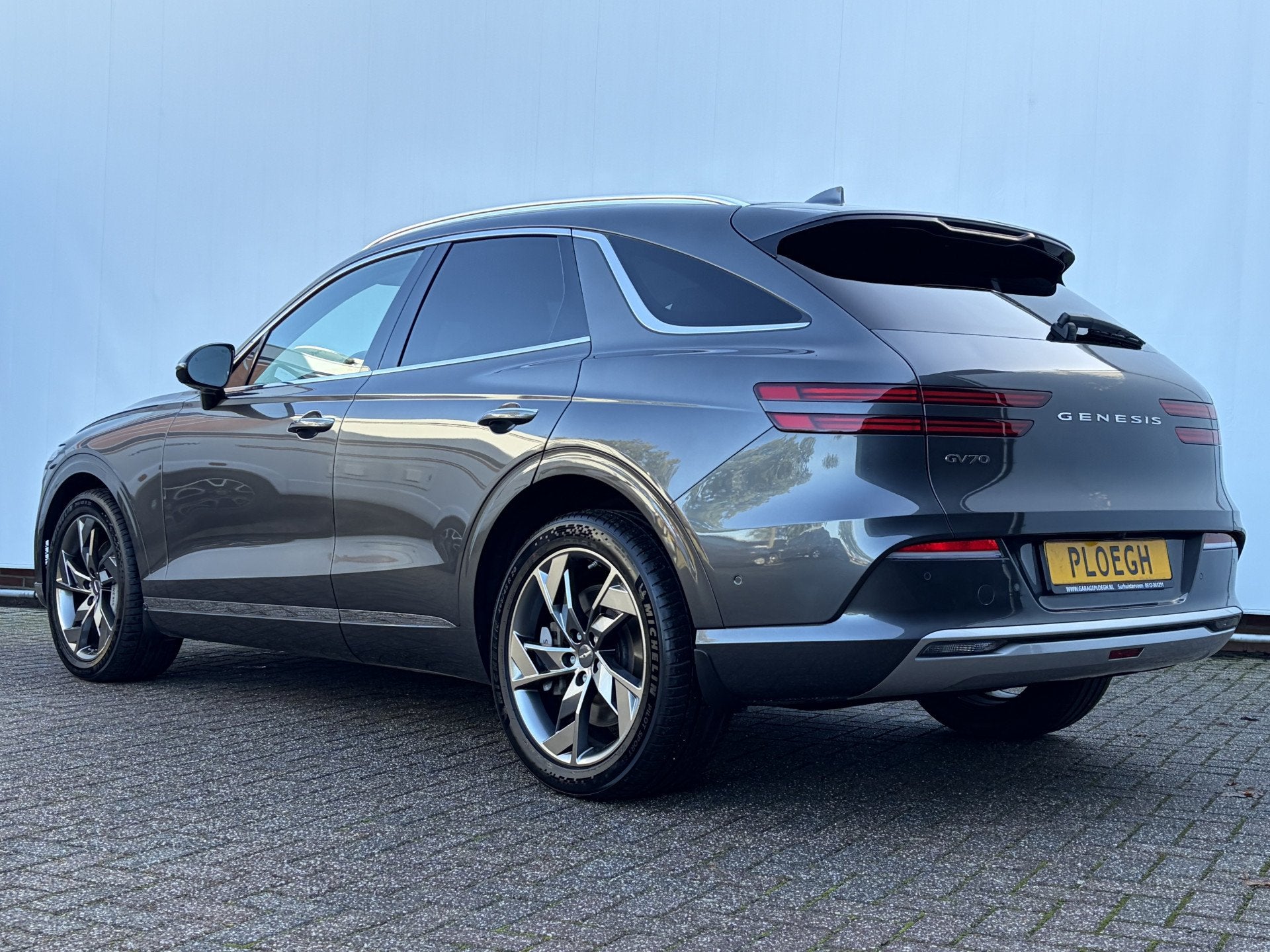 Genesis GV70 Pano SOH 98% Leer 360° HUD Stoelverw+Ventilati, Auto's, Automaat, Leder, 489 pk, Te koop