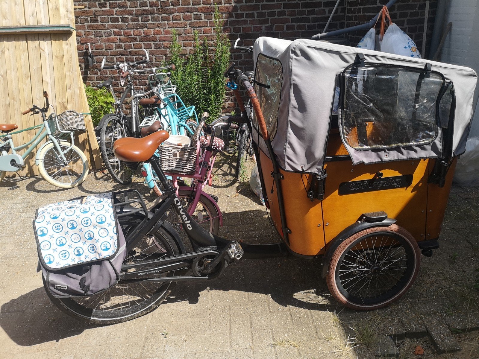 Elektrische Bakfiets Qivelo met Huif en 4 zitplaatsen, 4 kinderen of meer, Gebruikt, Elektrisch, Schijfrem