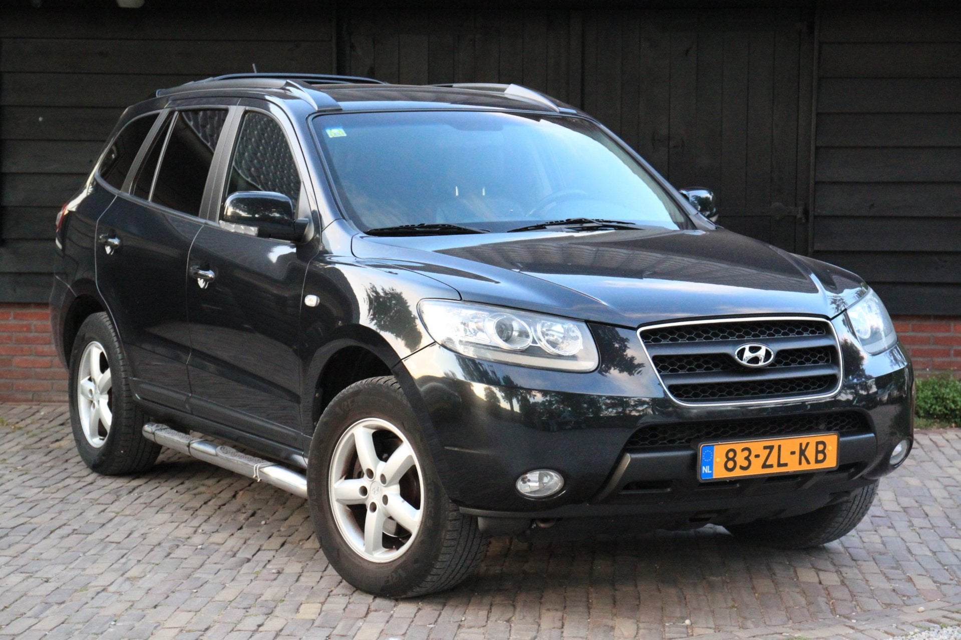 Hyundai Santa Fe 2.7i V6 4WD Business Edition Elek-Dak/Camer, Automaat, Santa Fe, Gebruikt, Zwart