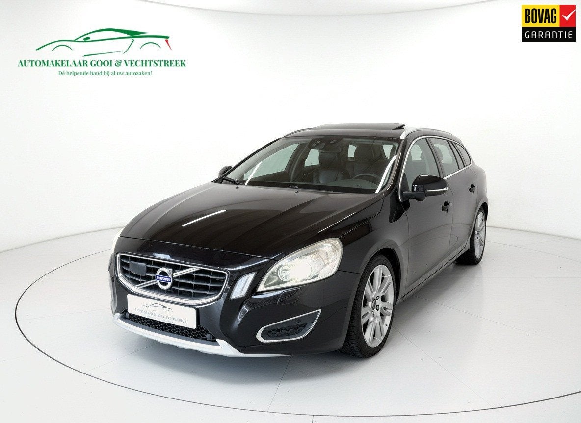 Volvo V60 2.0 T5 Momentum - Schuifdak - Memory - Trekhaak, Auto's, 1502 kg, 4 cilinders, Leder en Stof, Zwart