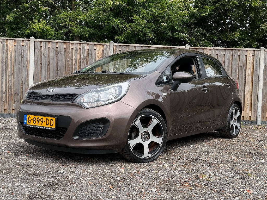 Kia Rio 2014 | Navi | Cruise Control | Trekhaak | Airco, 450 kg, 40 €/maand, 4 cilinders, Bruin