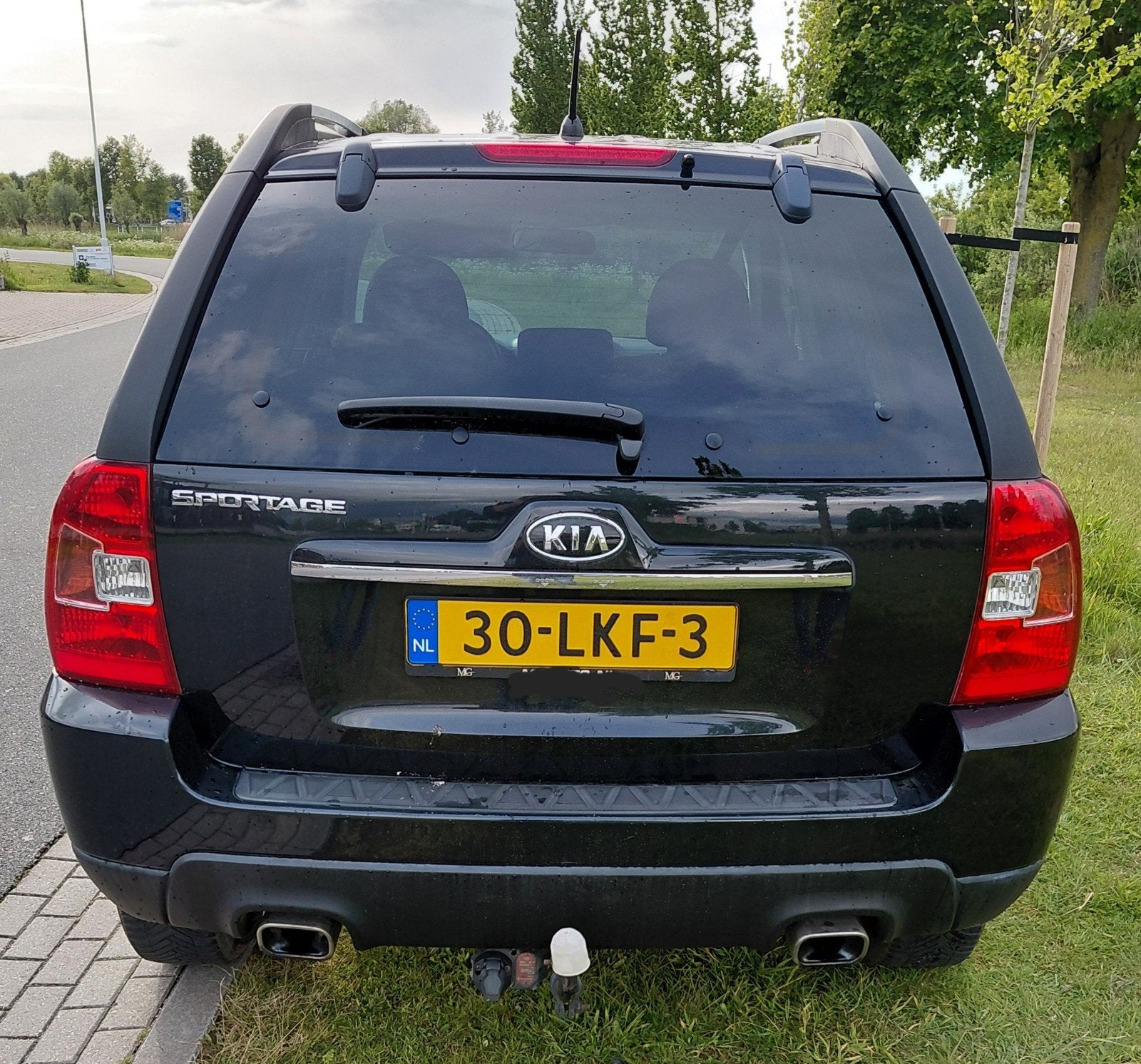 Kia Sportage 2.0 2WD 2010 Zwart, Auto's, 1442 kg, Stof, 4 cilinders, Zwart