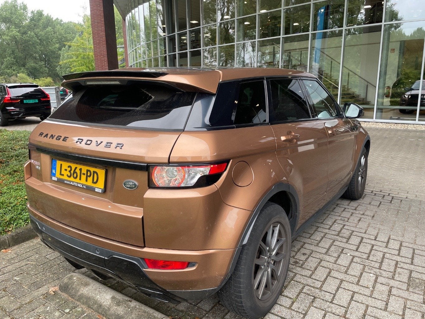 Land Rover Range Rover Evoque 2.0 Si 4WD Prestige Automaat,, Auto's, Zwart, Bruin, Leder, Bedrijf