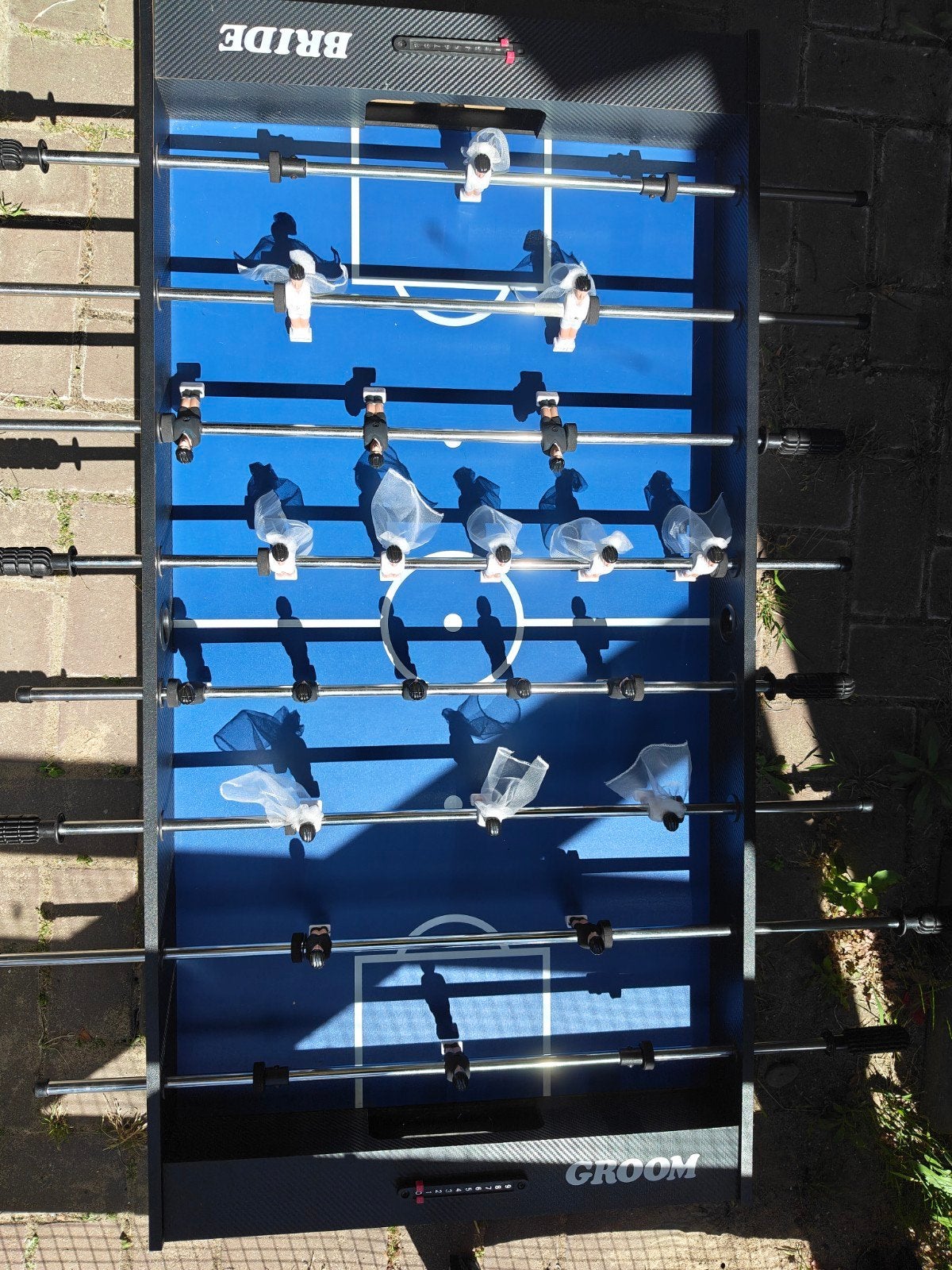 Bruiloft voetbaltafel, Ophalen