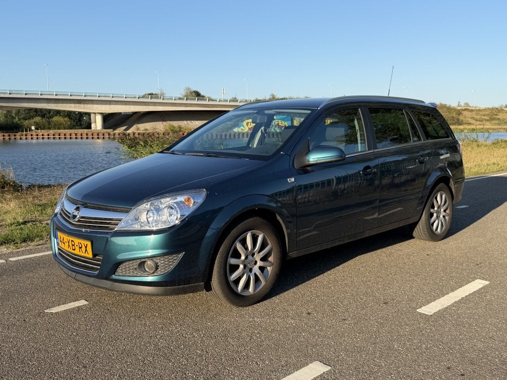 Opel Astra Wagon 1.6 Temptation (bj 2007), Auto's, 657 kg, 15 km/l, Gebruikt, Multifunctioneel stuurwiel