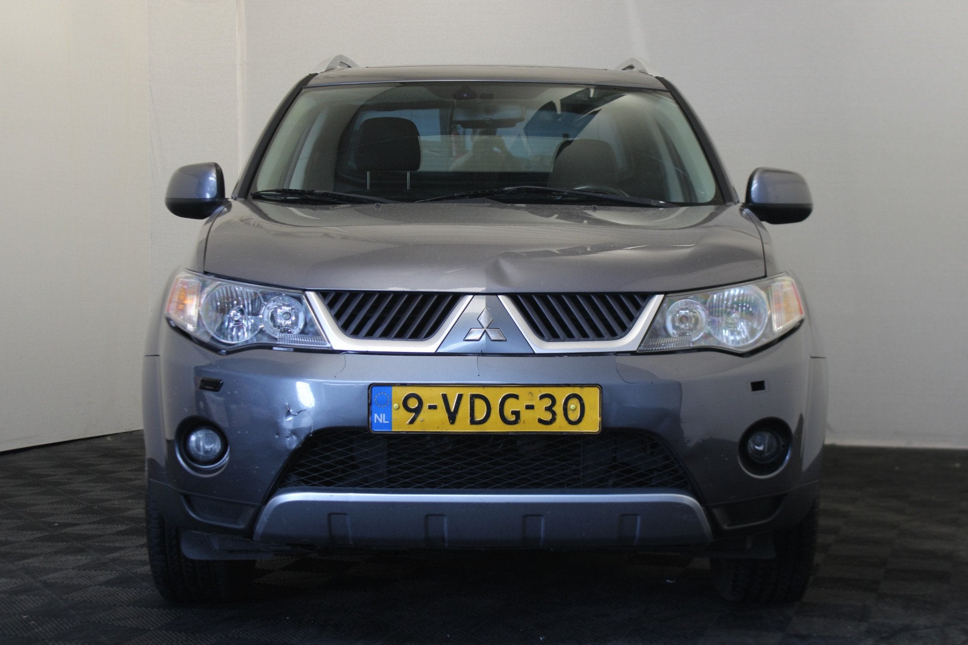 Mitsubishi Outlander 2.2 DI-D Intense + (bj 2009), Auto's, Bestelauto's, Gebruikt, Zwart, Vierwielaandrijving, 2 stoelen