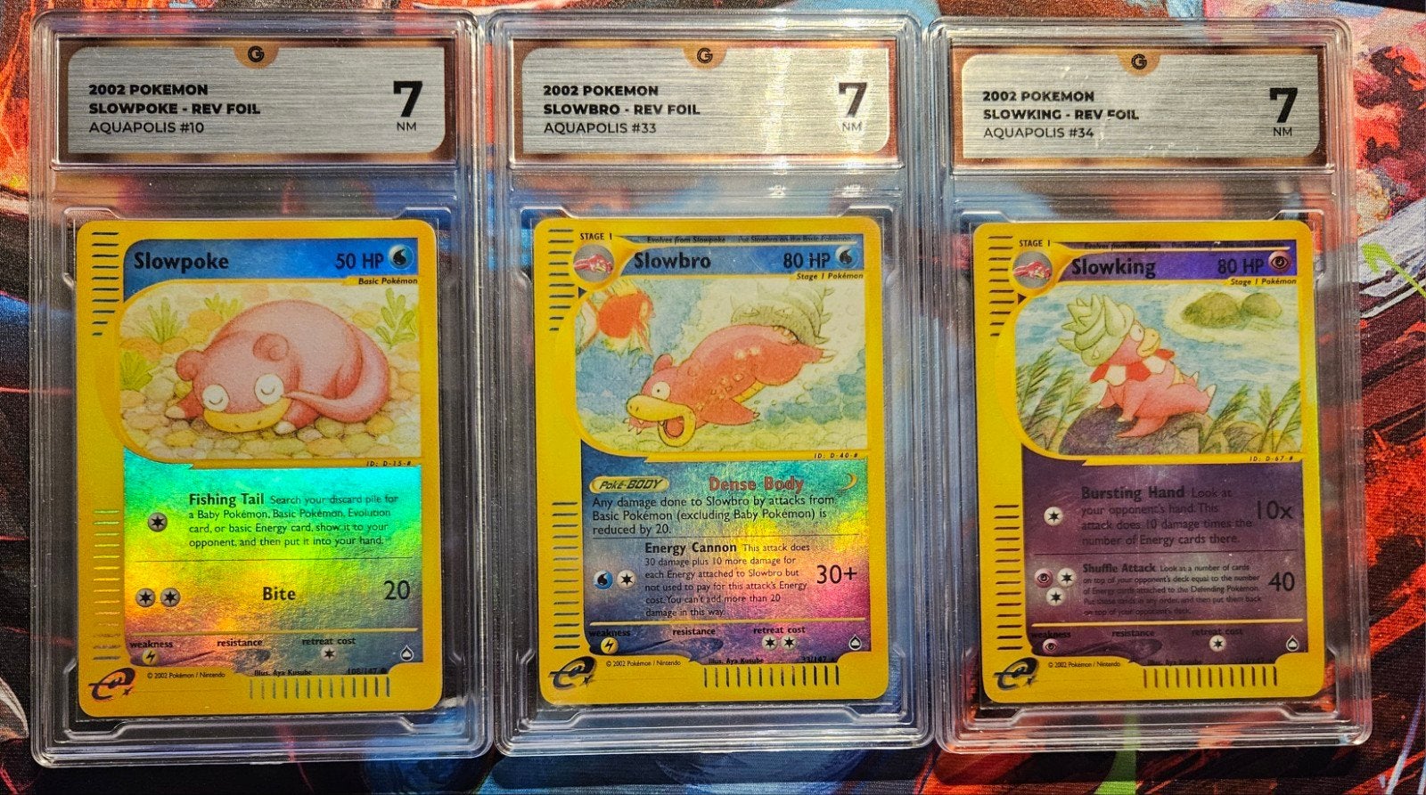 Pokémon Aquapolis Slowpoke, Slowbro, Slowking PSA 7 Set, Ophalen of Verzenden, Gebruikt, Meerdere kaarten, Foil