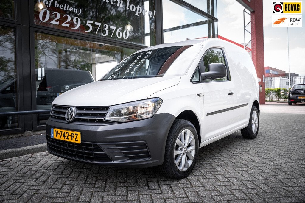 Volkswagen Caddy 1.6 TDI 102pk | Trekhaak | Cruise control |, Auto's, Voorwielaandrijving, Euro 5, Stof, Gebruikt