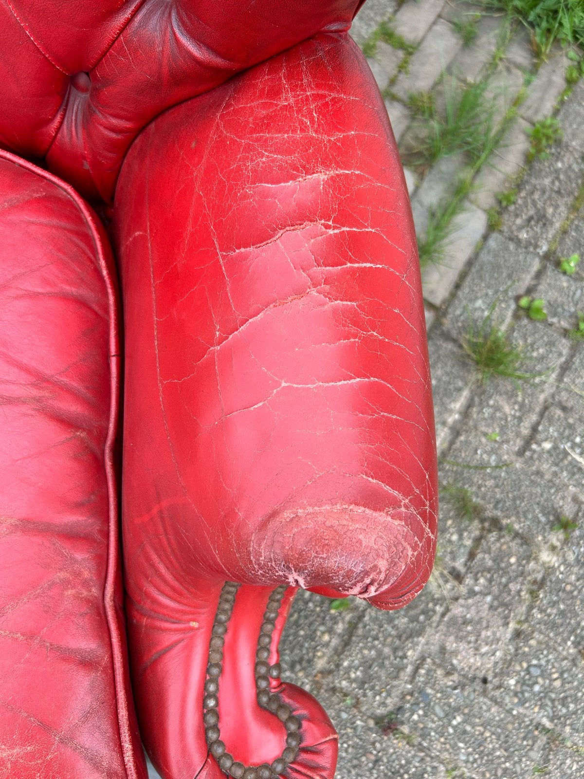 Klassieke rode leren fauteuil, Ophalen