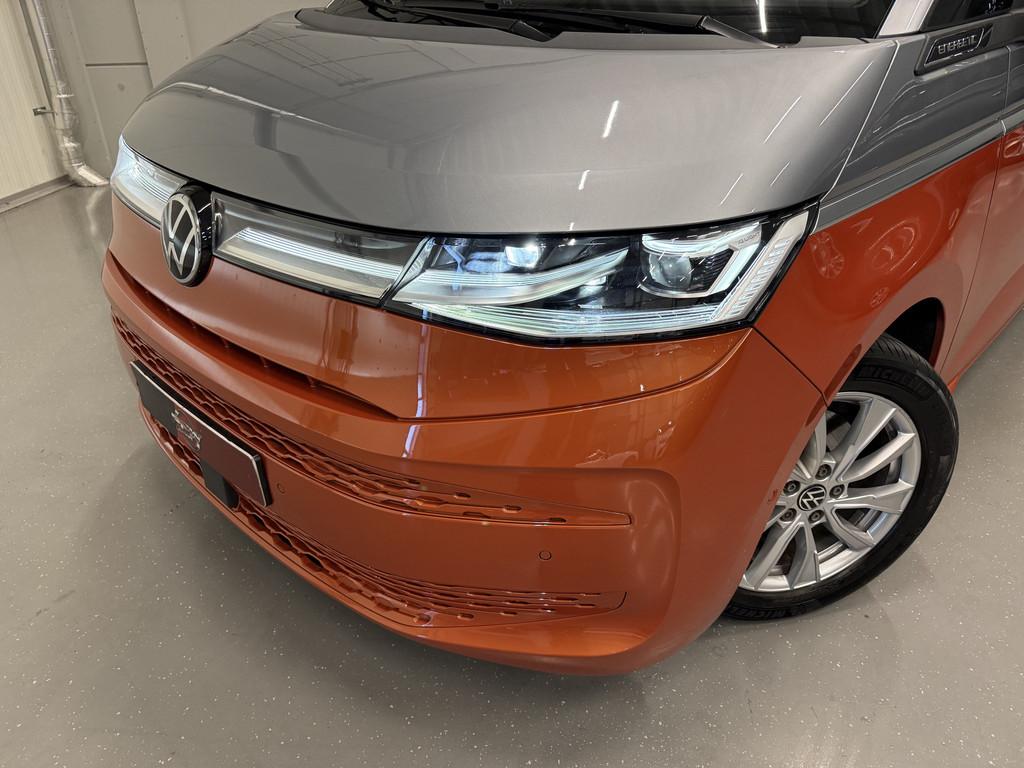 Volkswagen Multivan 1.4 eHybrid L2 Energetic 7p. PANO/HEAD-U, Stof, Gebruikt, Zwart, Met garantie (alle)