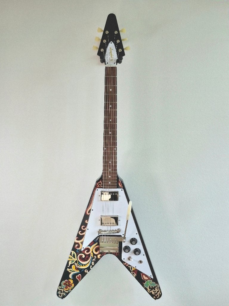 Epiphone Jimi Hendrix "Love Drops" Flying V – Nieuwstaat, Muziek en Instrumenten, Snaarinstrumenten | Gitaren | Elektrisch, Ophalen