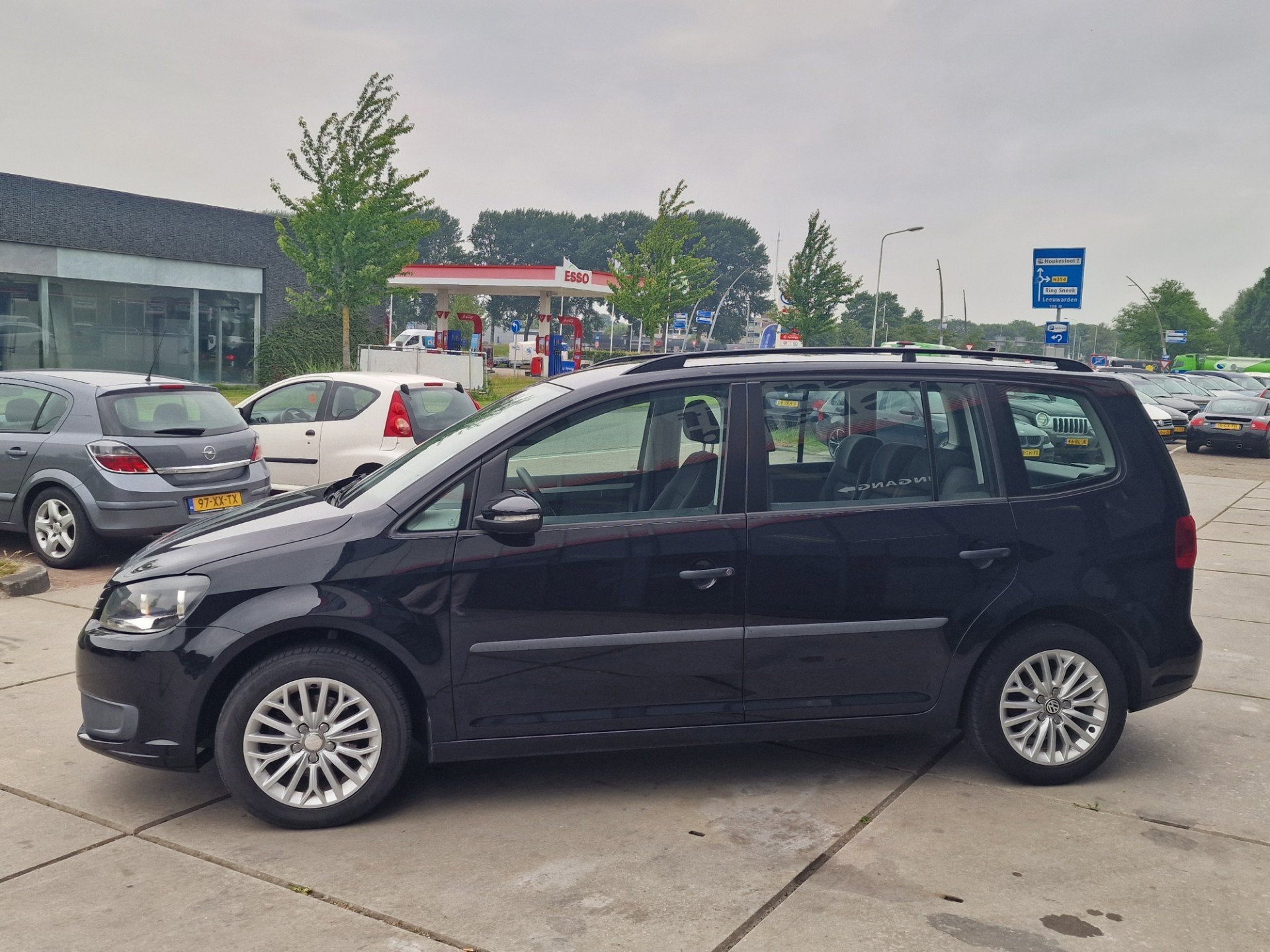 Volkswagen Touran 1.2 TSI Trendline BlueMotion - Navi - Clim, Auto's, Euro 5, Gebruikt, Zwart, 4 cilinders
