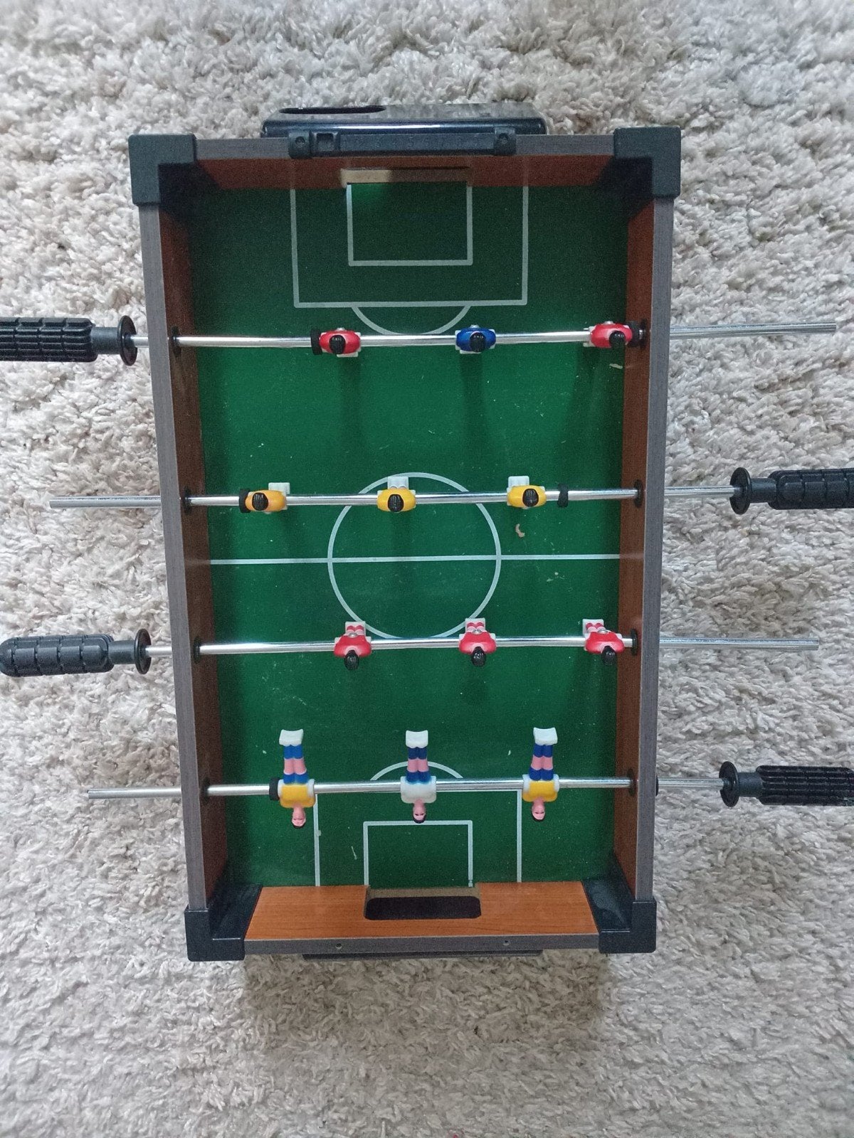 mini voetbaltafel, Ophalen