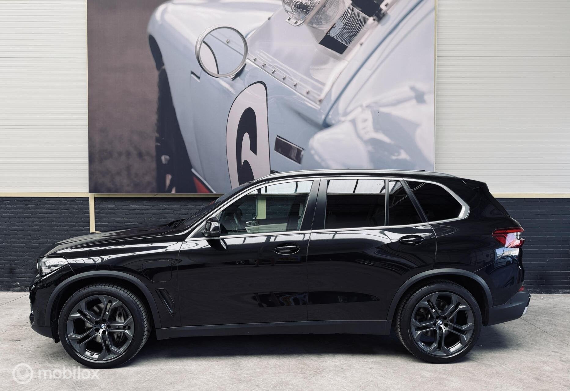BMW X5 xDrive45e|PANO|H&K|TREKHAAK|21INCH|CAMERA|, Auto's, Gebruikt, 394 pk, Zwart, Vierwielaandrijving