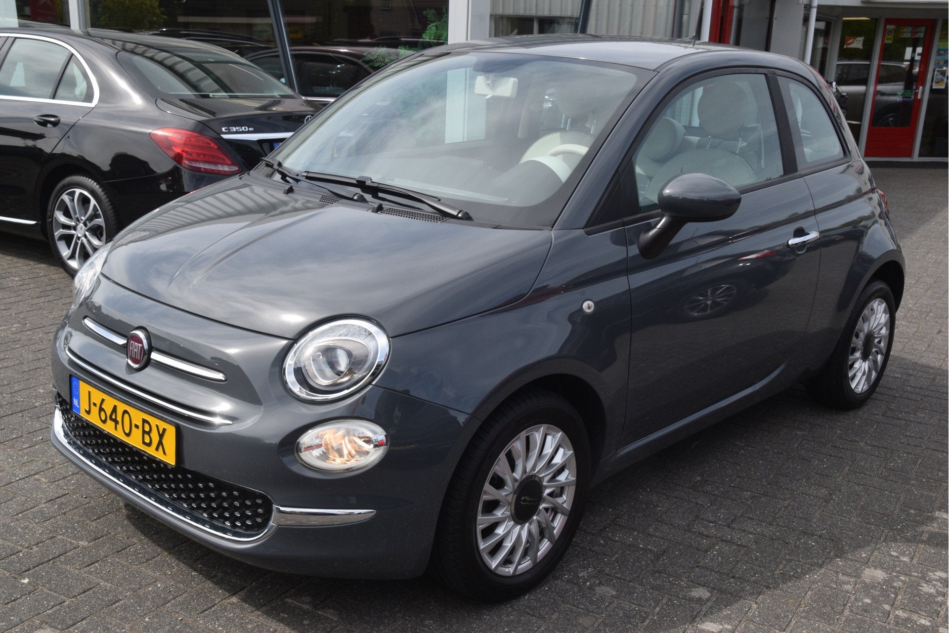 Fiat 500 1.0 Hybrid Lounge Carplay | PDC | Airco | Cruise |, Auto's, Voorwielaandrijving, Stof, Euro 6, Met garantie (alle)