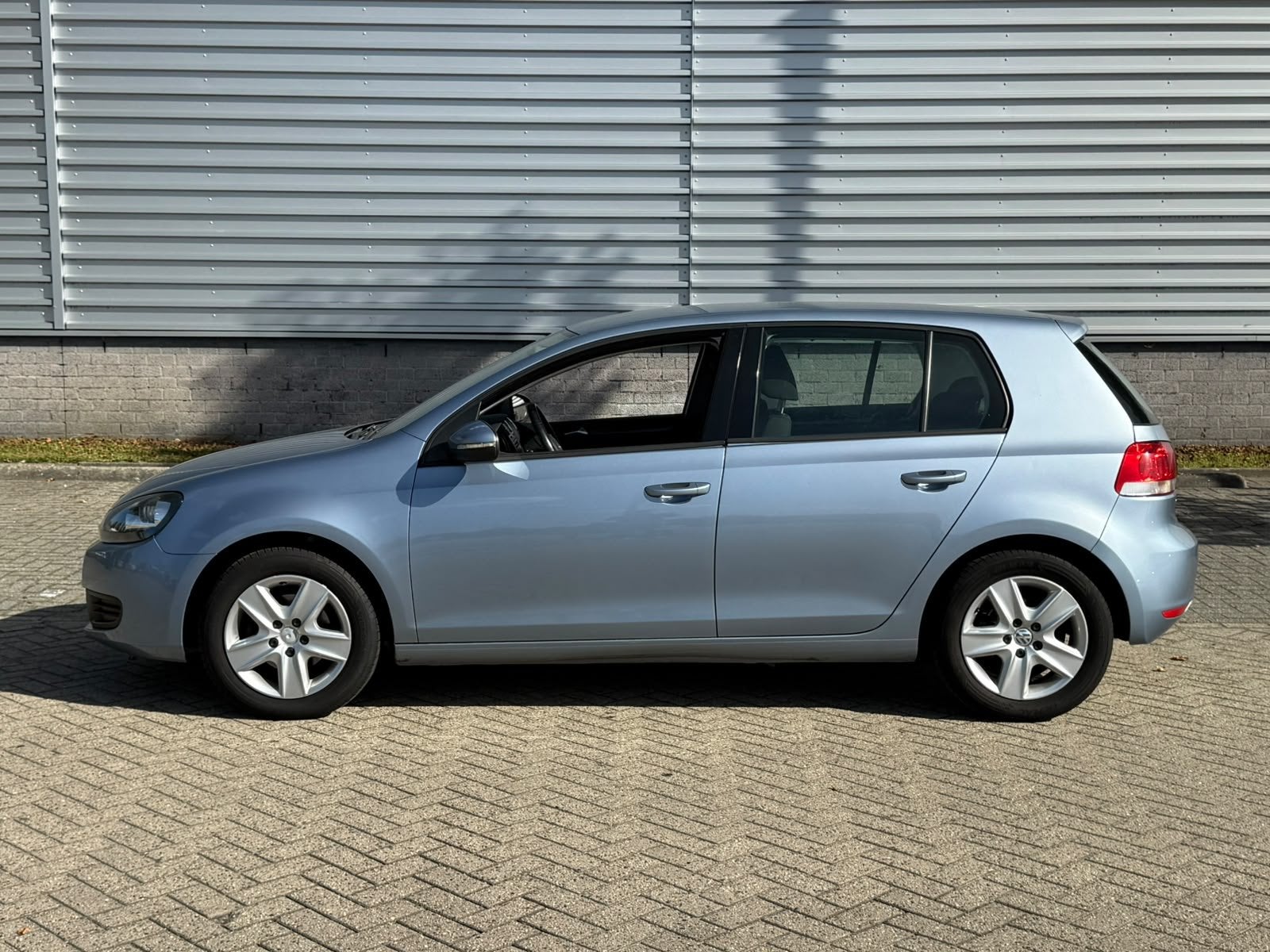 Volkswagen Golf 1.6 Comfortline (bj 2009), Voorwielaandrijving, Euro 5, Stof, Gebruikt