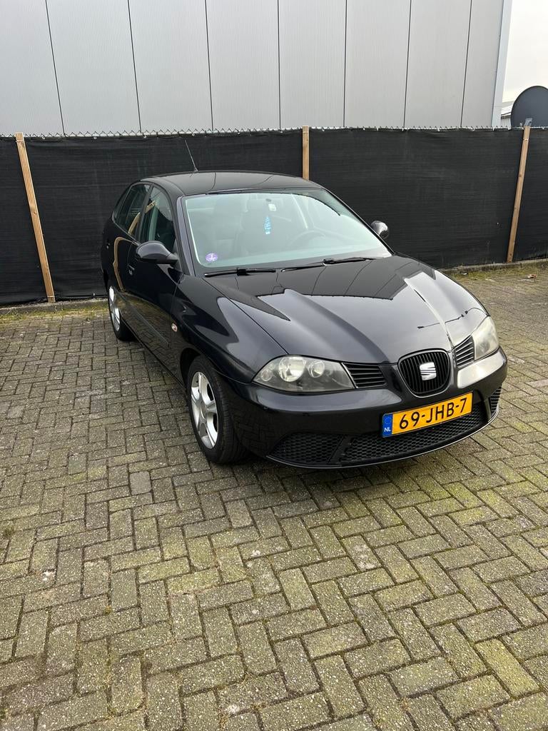 Seat Ibiza 1.4 16V 63KW 5DRS 2009 Zwart, Voorwielaandrijving, Stof, Zwart, Origineel Nederlands
