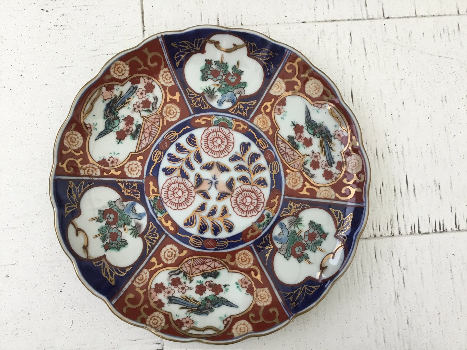 Gold Imari bord, Ophalen