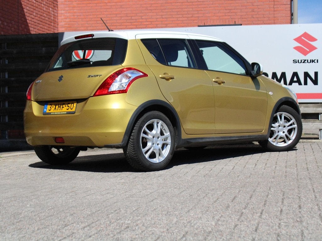 Suzuki Swift 1.2 Dynamic EASSS Stoelverwarming, Cruise Contr, Auto's, Suzuki, Stof, Gebruikt, 4 cilinders, 400 kg